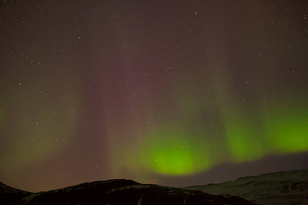 istock Different colors of northern lights in Iceland 489831082