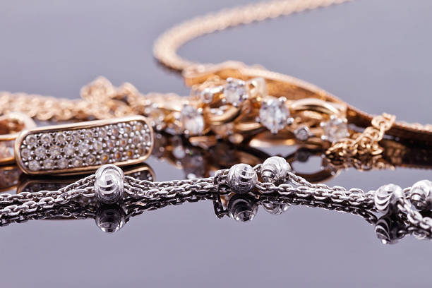 istock Gold earrings and elegant silver chain 489832190