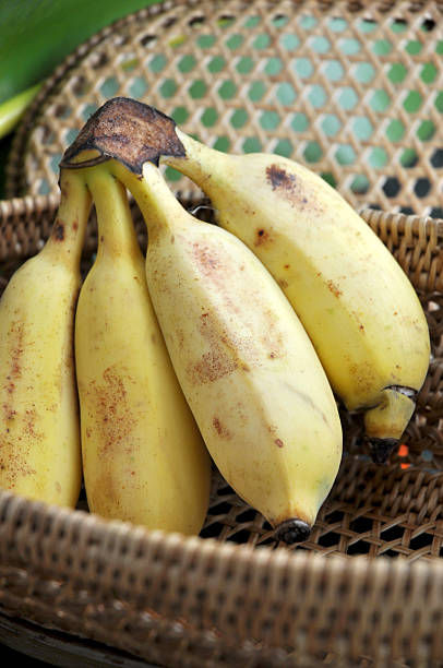 istock bunch of banana in basket 489832562