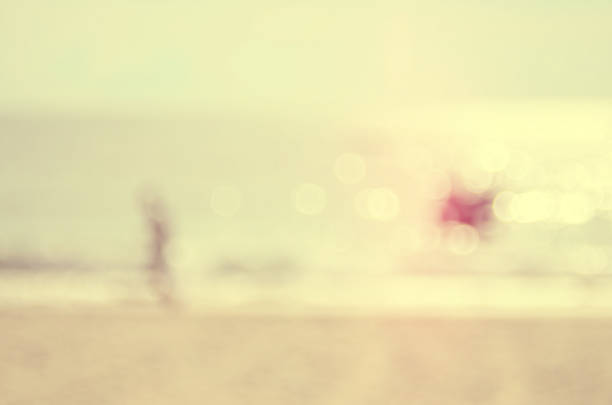 Blur man running on tropical beach abstract background.Retro color style.