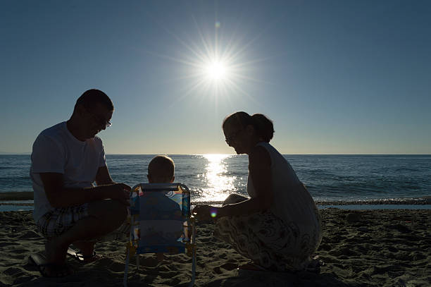 istock Playful grandparents on the beach 489834126