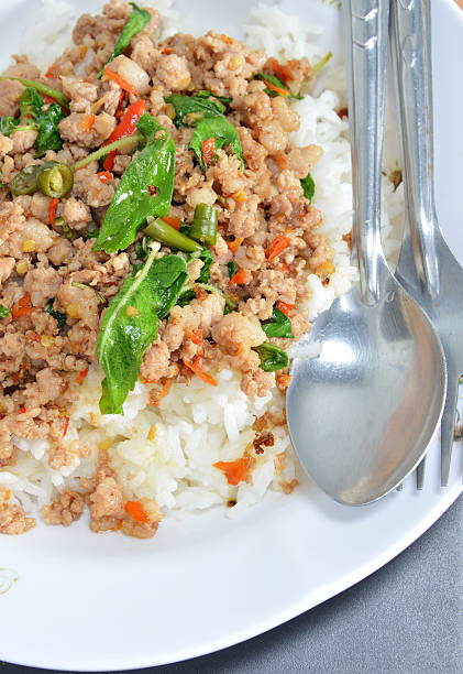 istock spicy stir-fried pork chop with basil leaf and chili 489834820