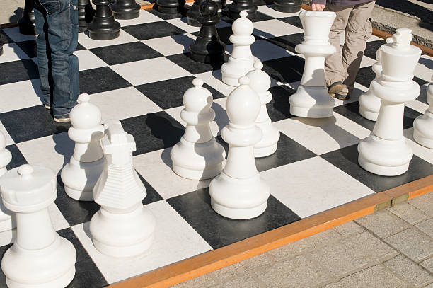 istock Children playing chess outdoors 489836024