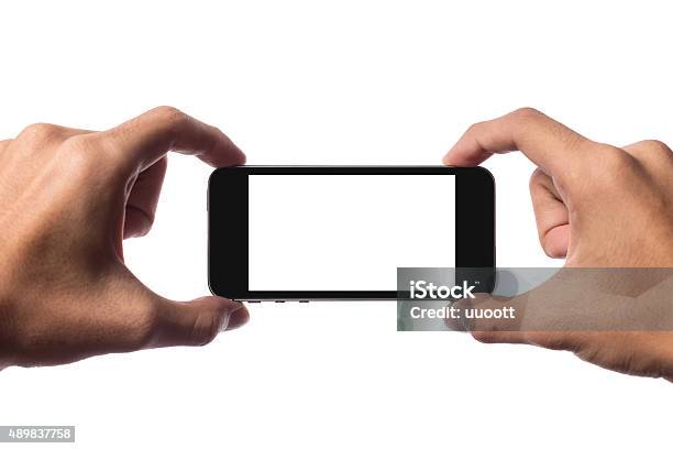 Holding Smartphone Stock Photo - Download Image Now - Mobile Phone, People, Photo Messaging