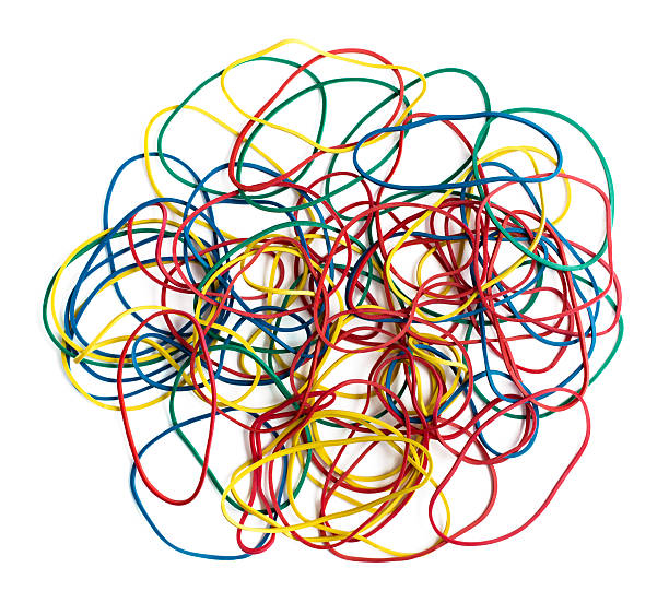 istock Colorful stationery rubber bands on white 489839378