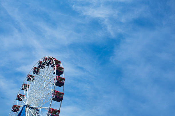istock Ferris wheel on the blue sky background 489841062