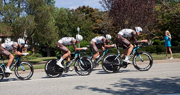 UCI Road World Championships Richmond, Virginia, United States- September 20, 2015: World class riders wearing brown, blue, and white cycle up an incline on Hermitage Road in Richmond, Virginia during time trials at the UCI Road World Championships, Sunday September 20, 2015. uci road world championships stock pictures, royalty-free photos & images