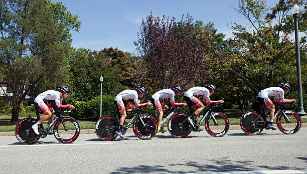 UCI Road World Championships Richmond, Virginia, United States- September 20, 2015: World class riders wearing white and red cycle up an incline on Hermitage Road in Richmond, Virginia during time trials at the UCI Road World Championships, Sunday September 20, 2015. uci road world championships stock pictures, royalty-free photos & images