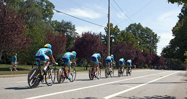 UCI Road World Championships Richmond, Virginia, United States- September 20, 2015: World class riders wearing light and dark blue cycle up an incline on Hermitage Road in Richmond, Virginia during time trials at the UCI Road World Championships, Sunday September 20, 2015. uci road world championships stock pictures, royalty-free photos & images