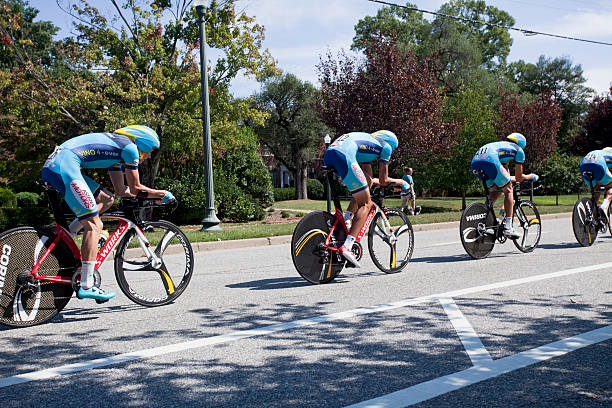 UCI Road World Championships Richmond, Virginia, United States- September 20, 2015: World class riders wearing light and dark blue cycle up an incline on Hermitage Road in Richmond, Virginia during time trials at the UCI Road World Championships, Sunday September 20, 2015. uci road world championships stock pictures, royalty-free photos & images