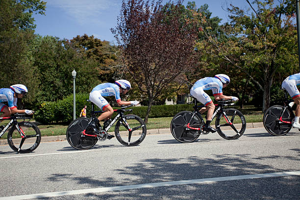 UCI Road World Championships Richmond, Virginia, United States- September 20, 2015: World class riders wearing white and powder blue cycle up an incline on Hermitage Road in Richmond, Virginia during time trials at the UCI Road World Championships, Sunday September 20, 2015. uci road world championships stock pictures, royalty-free photos & images