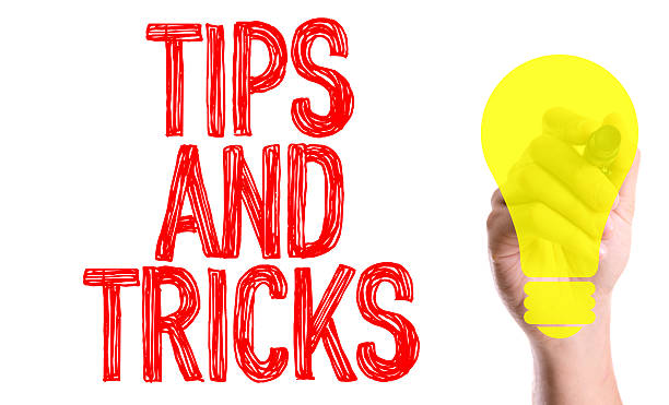 istock Hand with marker writing the word Tips and Tricks 489843160