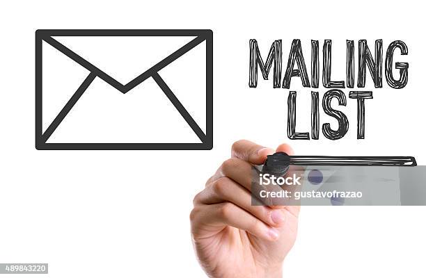 Hand With Marker Writing The Word Mailing List Stock Photo - Download Image Now - List, Sending, E-Mail