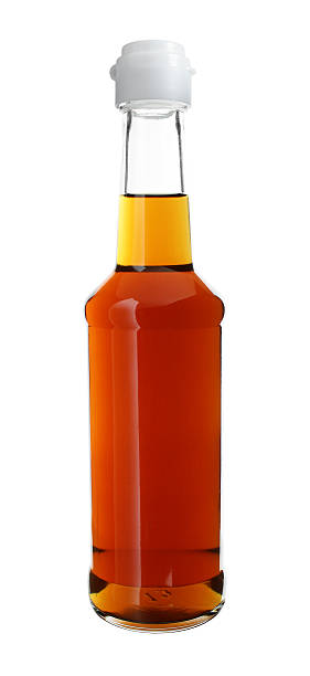 Sauce in Long Neck Glass Bottle isolated on white background