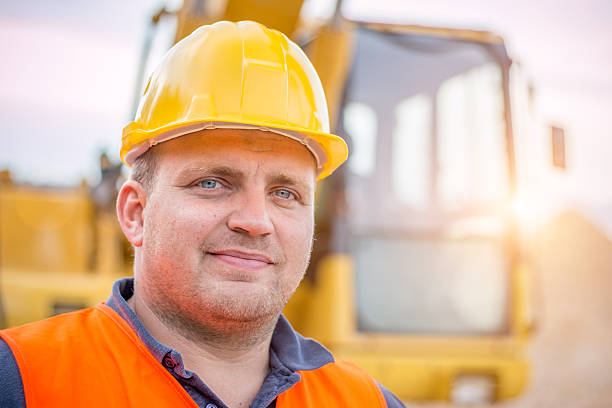 istock Portrait of an Earth Digger Driver at construction site 489864968