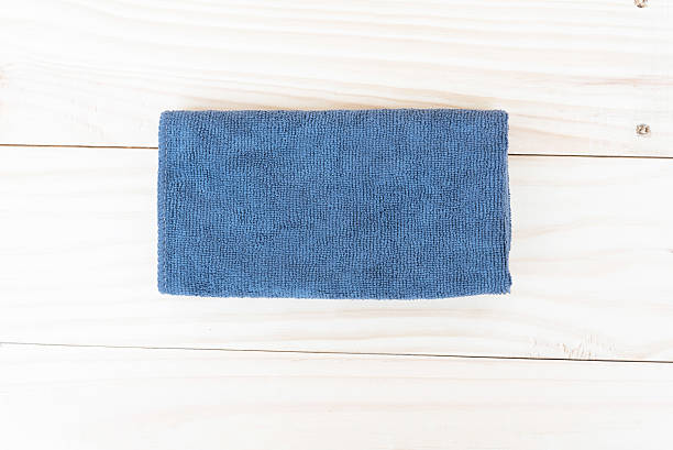 istock blue Fiber Fabric on wood background 489865194