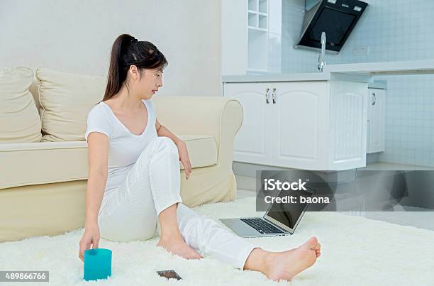 Asian Woman Working At Home Stock Photo - Download Image Now - 2015, 30-39 Years, Adult