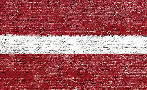 istock Latvia - National flag on Brick wall 489867004