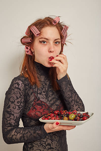 istock woman with berry 489870262