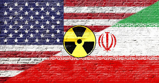 United states and Iran - National flags on Brick wall stock photo