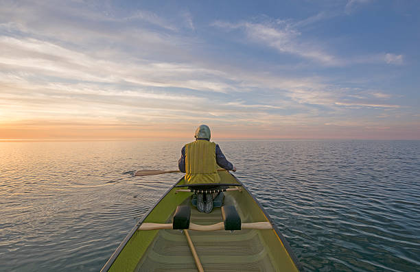 The bow of the kayak floating in the sea.