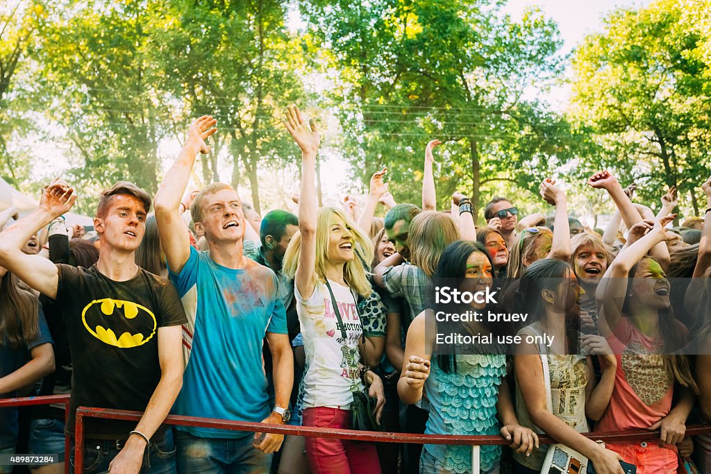 Young people having fun together at Holi color festival Gomel, Belarus - August 30, 2015: Young people having fun together at Holi color festival in park 20-24 Years Stock Photo
