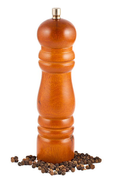 istock Wooden pepper mill and peppercorn 489901504