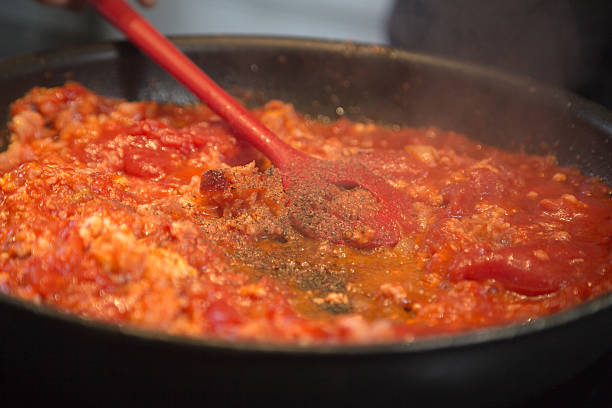 istock cooking bolognese sauce 489901760