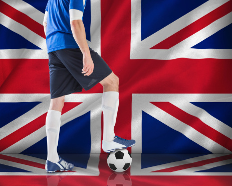 Great Britain flag in an illuminated soccer stadium. 3d illustration