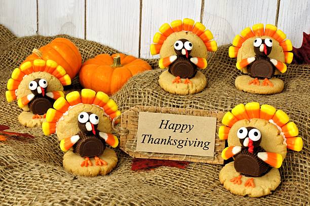 istock Turkey shaped cookies with Happy Thanksgiving card on burlap 489905818