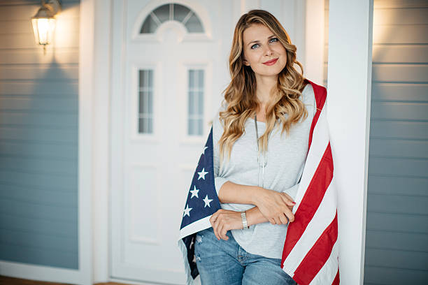 istock Woman in front of a house. 489906026