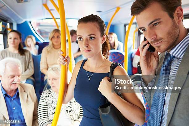 Passengers Standing On Busy Commuter Bus Stock Photo - Download Image Now - Bus, Crowded, Passenger