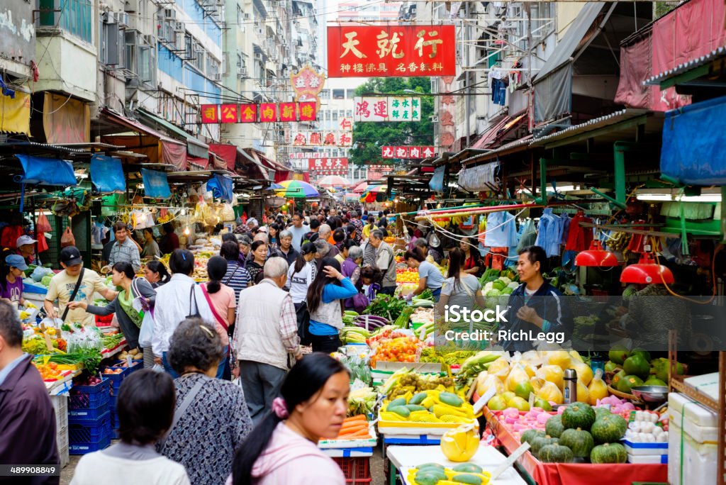 Hong Kong Street Market A busy street produce market in Hong Kong, China. Market - Retail Space Stock Photo