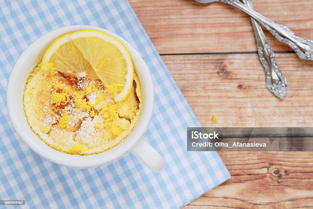 lemon pudding in a white cup lemon pudding in a white cup, top , food Backgrounds Stock Photo