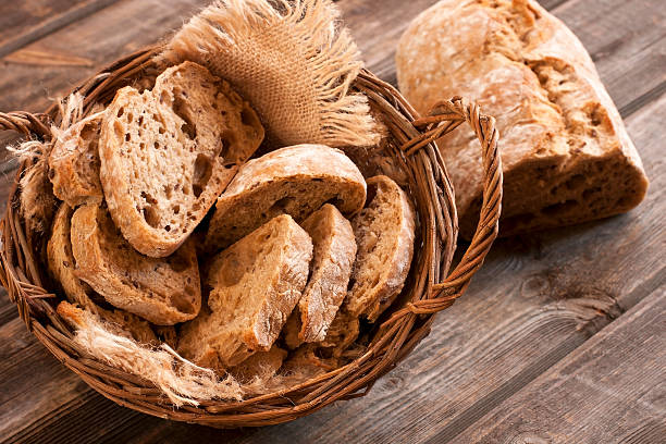 istock Tasty baguette on a wooden board 489910093