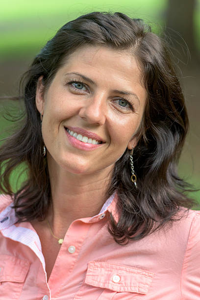 istock Smiling mature woman 489910580