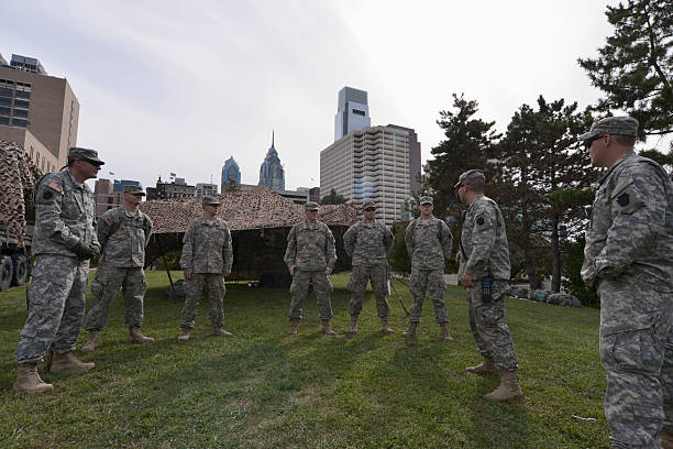 Philadelphia, PA, USA - September 25, 2015: 112 P.A. Battalion of U.S. National Guard is briefed at a temporary tacts camp, located at the Center City Philadelphia Vine Express Way exit. The unit is assigned to the security detail that is in place during the historic visit of Pope Francis I to the United States and Philadelphia, PA. (photo by Bastiaan Slabbers)