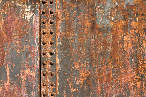 Rusty stained metal plate background