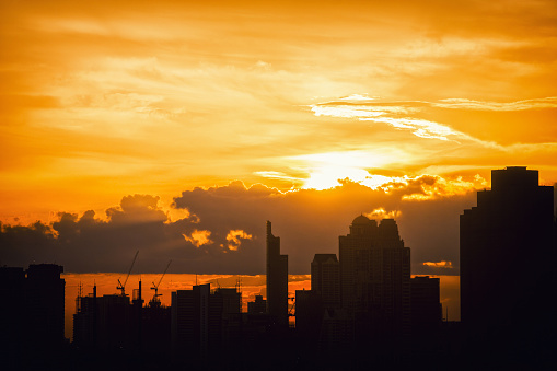 Bangkok city and Sunset with building silhouette
