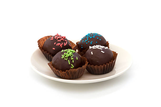 istock Chocolate balls isolated on white background 489924810