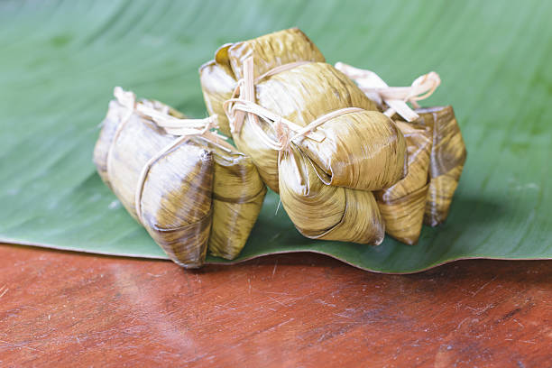 istock rice steamed in green banana leaf 489924908