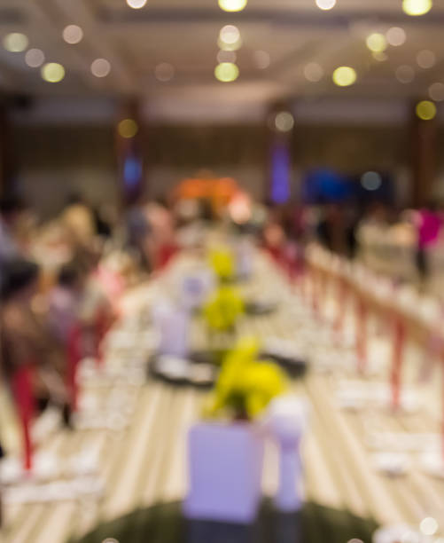 istock blur formal dining table in grand hall of hotel 489925020
