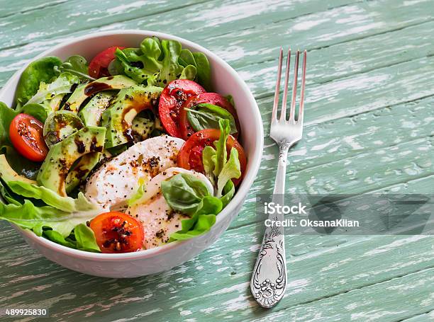 Fresh Salad With Avocado Tomato And Mozzarella Stock Photo - Download Image Now - 2015, Appetizer, Arugula
