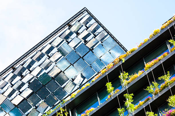 istock Heliostats, low angle view, motorised mirrors on high rise building 489926280