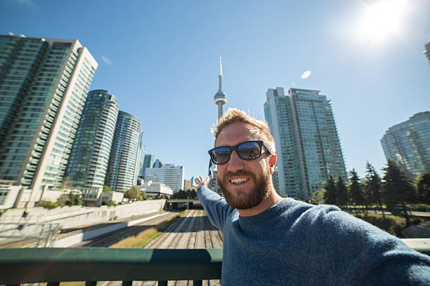 istock Tourist taking selfie portrait in Toronto 489926674