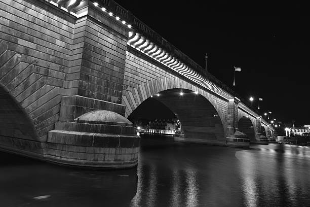 London Bridge is a bridge in Lake Havasu City, Arizona, United States. It is a relocated 1831 bridge that formerly spanned the River Thames in London, England, until it was dismantled in 1967. The Arizona bridge is a reinforced concrete structure clad in the original masonry of the 1830s bridge, which was bought by Robert P. McCulloch from the City of London. McCulloch had exterior granite blocks from the original bridge numbered and transported to America to construct the present bridge in Lake Havasu City, a planned community he established in 1964 on the shore of Lake Havasu. The bridge was completed in 1971 (along with a canal), and links an island in the Colorado River with the main part of Lake Havasu City.