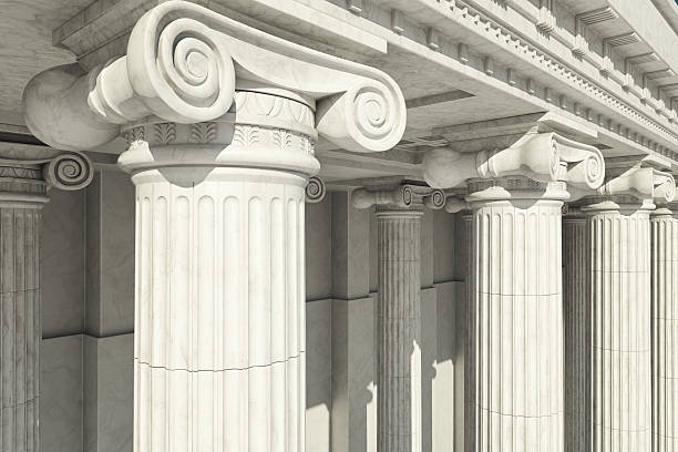 Columns. ionic order. Close-up shot of a line of Greek-style columns. architectural column stock pictures, royalty-free photos & images