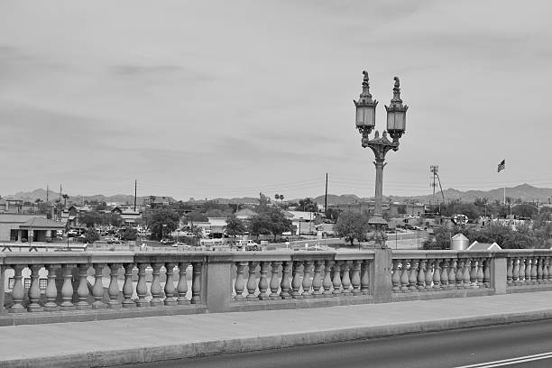 London Bridge is a bridge in Lake Havasu City, Arizona, United States. It is a relocated 1831 bridge that formerly spanned the River Thames in London, England, until it was dismantled in 1967. The Arizona bridge is a reinforced concrete structure clad in the original masonry of the 1830s bridge, which was bought by Robert P. McCulloch from the City of London. McCulloch had exterior granite blocks from the original bridge numbered and transported to America to construct the present bridge in Lake Havasu City, a planned community he established in 1964 on the shore of Lake Havasu. The bridge was completed in 1971 (along with a canal), and links an island in the Colorado River with the main part of Lake Havasu City.