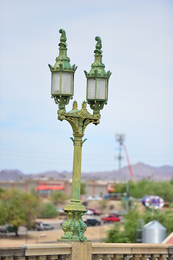 London Bridge is a bridge in Lake Havasu City, Arizona, United States. It is a relocated 1831 bridge that formerly spanned the River Thames in London, England, until it was dismantled in 1967. The Arizona bridge is a reinforced concrete structure clad in the original masonry of the 1830s bridge, which was bought by Robert P. McCulloch from the City of London. McCulloch had exterior granite blocks from the original bridge numbered and transported to America to construct the present bridge in Lake Havasu City, a planned community he established in 1964 on the shore of Lake Havasu. The bridge was completed in 1971 (along with a canal), and links an island in the Colorado River with the main part of Lake Havasu City.