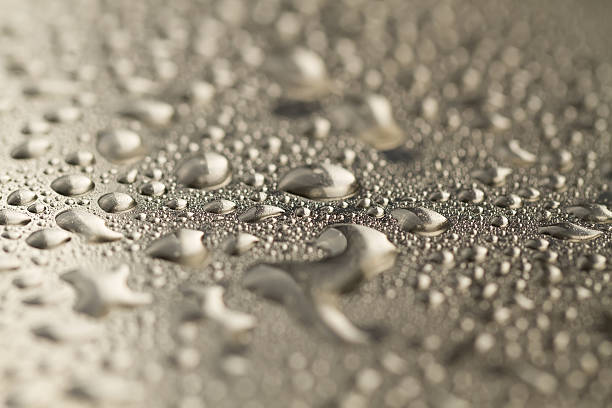 istock water drops on metal background 489937838